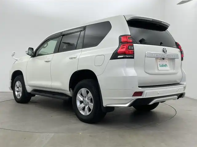 トヨタ ランドクルーザー プラド TX Lパッケージ 富山県 2023(令5)年 2.1万km ホワイトパールクリスタルシャイン サンルーフ/モデリスタエアロ/純正ナビ（AM/FM/DVD/BT/フルセグ）/バックカメラ/ドライブレコーダー/ETC/レザーシート/D/N席パワーシート/D/N席シートヒーター/D/N席シートベンチレーション/衝突被害軽減システム/レーダークルーズコントロール/レーンキープアシスト/コーナーセンサー/横滑り防止装置/純正アルミホイール/純正フロアマット/革巻きステアリング/ステアリングスイッチ/スマートキー