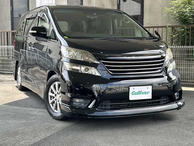 トヨタ ヴェルファイア 2．4Z プラチナセレクションⅡ 京都府 2010(平22)年 9.6万km ブラック アルパインＳＤナビ8インチ　/（VIE-X088)/フルセグＴＶ　/両側パワースライドドア　/アルパインフリップダウンモニター　/バックカメラ　/前後コーナーセンサー/電動リアゲート/スマートキー　/ウィンカーミラー　/ビルトインETC　/盗難防止装置/パワーステアリング/パワーウィンドウ/CD/DVD再生機能有/Bluetooth/オットマン/電動リアゲート/横滑り防止/Wサイドエアバッグ/社外車高調/フルエアロ/Rスポイラー/ローダウン/シートカバー