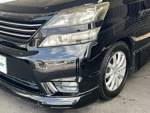 トヨタ ヴェルファイア 2．4Z プラチナセレクションⅡ 京都府 2010(平22)年 9.6万km ブラック アルパインＳＤナビ8インチ　/（VIE-X088)/フルセグＴＶ　/両側パワースライドドア　/アルパインフリップダウンモニター　/バックカメラ　/前後コーナーセンサー/電動リアゲート/スマートキー　/ウィンカーミラー　/ビルトインETC　/盗難防止装置/パワーステアリング/パワーウィンドウ/CD/DVD再生機能有/Bluetooth/オットマン/電動リアゲート/横滑り防止/Wサイドエアバッグ/社外車高調/フルエアロ/Rスポイラー/ローダウン/シートカバー