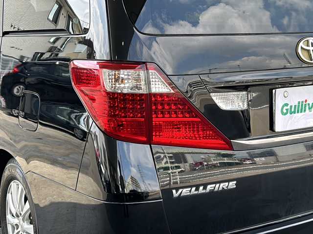 トヨタ ヴェルファイア 2．4Z プラチナセレクションⅡ 京都府 2010(平22)年 9.6万km ブラック アルパインＳＤナビ8インチ　/（VIE-X088)/フルセグＴＶ　/両側パワースライドドア　/アルパインフリップダウンモニター　/バックカメラ　/前後コーナーセンサー/電動リアゲート/スマートキー　/ウィンカーミラー　/ビルトインETC　/盗難防止装置/パワーステアリング/パワーウィンドウ/CD/DVD再生機能有/Bluetooth/オットマン/電動リアゲート/横滑り防止/Wサイドエアバッグ/社外車高調/フルエアロ/Rスポイラー/ローダウン/シートカバー