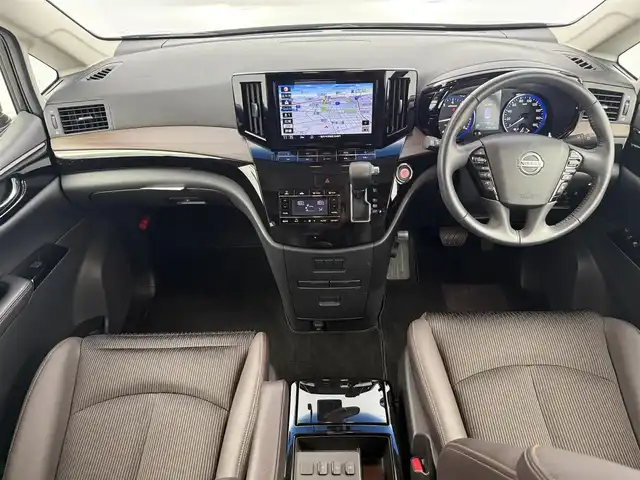 日産 エルグランド 250ハイウェイスターS 愛知県 2021(令3)年 1.8万km 黒 純正OP NISMO　フロントエアロパーツ/純正ワイドナビ/（Bluetooth/フルセグTV/SD/HDMI/CD/DVD/Blu-ray/AM・FM）/全方位カメラ/両側パワースライドドア/パワーバックドア/ハーフレザー/ブラインドスポットモニター/ETC/ドラレコ/純正フロアマット/オートライト/スマートキー/ステアリングリモコン/衝突軽減システム/ACC/テレビキャンセラー/プッシュスタート/純正AW/サンシェード/オットマン