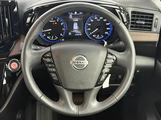 日産 エルグランド 250ハイウェイスターS 愛知県 2021(令3)年 1.8万km 黒 純正OP NISMO　フロントエアロパーツ/純正ワイドナビ/（Bluetooth/フルセグTV/SD/HDMI/CD/DVD/Blu-ray/AM・FM）/全方位カメラ/両側パワースライドドア/パワーバックドア/ハーフレザー/ブラインドスポットモニター/ETC/ドラレコ/純正フロアマット/オートライト/スマートキー/ステアリングリモコン/衝突軽減システム/ACC/テレビキャンセラー/プッシュスタート/純正AW/サンシェード/オットマン