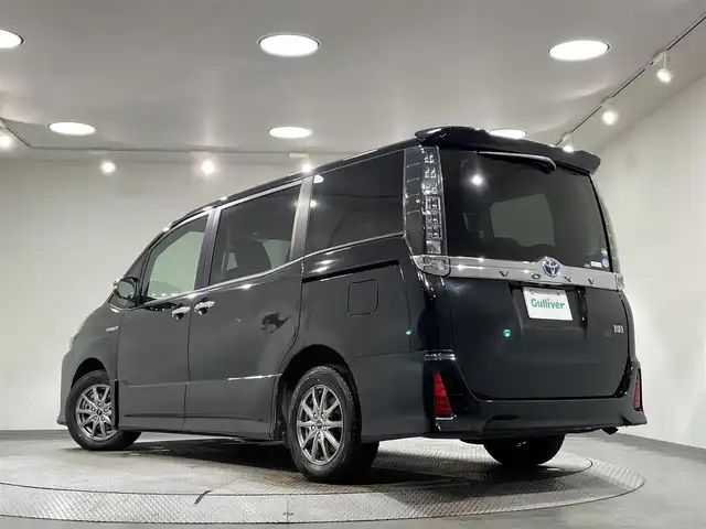 トヨタ ヴォクシー ハイブリッド ZS 煌Ⅱ 愛知県 2017(平29)年 8万km ブラック アルパインＢＩＧＸ１１インチ/アルパインフリップダウンモニター/ダブルゾーン/両側パワースライドドア/プリクラッシュセーフティ　/レーンディパーチャーアラート/先行車発進告知/オートハイビーム/アクセサリーソケット　/ビルトインＥＴＣ/バックカメラ/ISOFIX/プッシュスタート