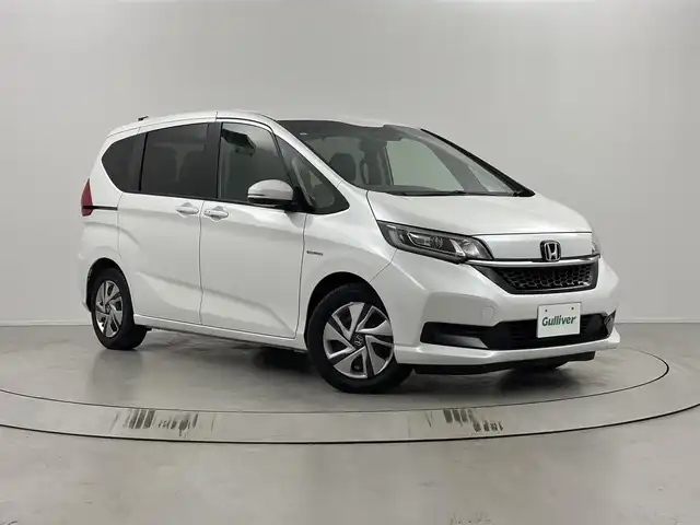 ホンダ フリード ハイブリット G ホンダセンシング 埼玉県 2021(令3)年 4.3万km プラチナホワイトパール 純正SDナビ/（BT/CD/DVD/USB/SD/フルセグ）/ドライブレコーダー/ビルトインETC/前席シートヒーター/バックカメラ/両側パワースライドドア/レーダークルーズコントロール/コーナーセンサー/スマートキー