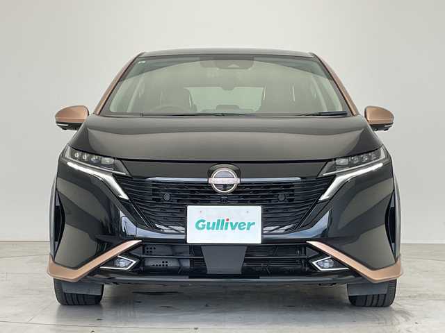 日産 オーラ G 神奈川県 2021(令3)年 4.1万km ミッドナイトブラック/サンライズカッパー プロパイロット/BOSEプレミアムサウンド/純正9インチディスプレイオーディオナビ（あり）/三眼LEDヘッドライト/全方位カメラ/クルーズコントロール/コーナーセンサー/純正アルミホイール/ETC2.0/ブラインドスポットモニター/インテリジェントミラー/オートマチックハイビーム/ワイヤレス充電器/衝突被害軽減ブレーキ/フルセグTV/Bluetooth/ステアリングスイッチ/スマートキー/プッシュスタート