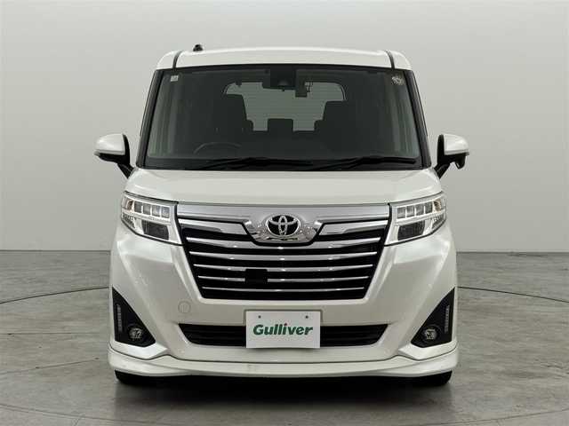 トヨタ ルーミー カスタムG S 山形県 2018(平30)年 9.2万km パールホワイトⅢ (株)IDOMが運営する【じしゃロン山形店】の自社ローン専用車両になります。/こちらは現金またはオートローンご利用時の価格です。/自社ローンご希望の方は別途その旨お申付け下さい。/純正９型ナビ（ＢＴ，フルセグＴＶ）　/バックカメラ　/ビルトインＥＴＣ２．０　/前後ドラレコ　/クルーズコントロール　/コーナーセンサー　/衝突軽減ブレーキ　/両側電動スライドドア　/純正１４インチＡＷ　/ＬＥＤライト