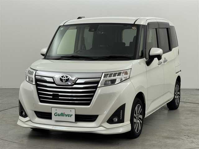 トヨタ ルーミー カスタムG S 山形県 2018(平30)年 9.2万km パールホワイトⅢ (株)IDOMが運営する【じしゃロン山形店】の自社ローン専用車両になります。/こちらは現金またはオートローンご利用時の価格です。/自社ローンご希望の方は別途その旨お申付け下さい。/純正９型ナビ（ＢＴ，フルセグＴＶ）　/バックカメラ　/ビルトインＥＴＣ２．０　/前後ドラレコ　/クルーズコントロール　/コーナーセンサー　/衝突軽減ブレーキ　/両側電動スライドドア　/純正１４インチＡＷ　/ＬＥＤライト