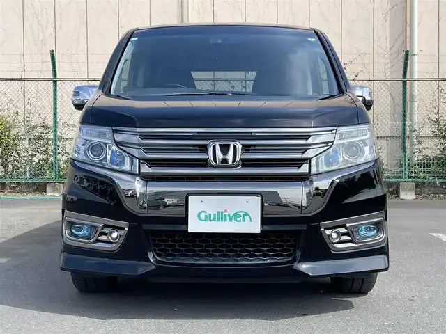 ホンダ ステップワゴン スパーダ Z クールスピリット 東京都 2015(平27)年 8.5万km プレミアムスパークルブラックパール 純正9インチプレミアムインターナビ/AM/FM/CD/DVD/SD/Bluetooth/フルセグTV/バックカメラ/両側パワースライドドア/クルーズコントロール/COOL SPIRIT専用コンビシート（プライムスムース×ファブリック）/ディスチャージヘッドライト（HID）/アクティブコーナリングライト/スマートキー×２/LEDアクセサリーランプ内蔵ダーククロームメッキフロントグリル/スパーダ専用17インチアルミホイール/ETC/ドライブレコーダー（CSD-500FHR)/GPSレーダー（AR-282GA)