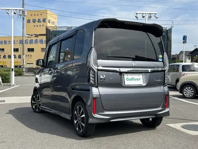 ホンダ Ｎ ＢＯＸ カスタム G L ホンダセンシング 愛媛県 2020(令2)年 1.6万km シャイニンググレーM 登録時走行距離151931km/ディーラーオプション純正ナビ/CD/DVD/TV/Bluetooth/バックカメラ/ビルトインETC/衝突軽減ブレーキ/車線維持支援システム/横滑り防止装置/前後コーナーセンサー/追従クルーズコントロール/助手席パワースライドドア/オートライト/LEDヘッドライト/スマートキー/純正アルミホイール/純正フロアマット