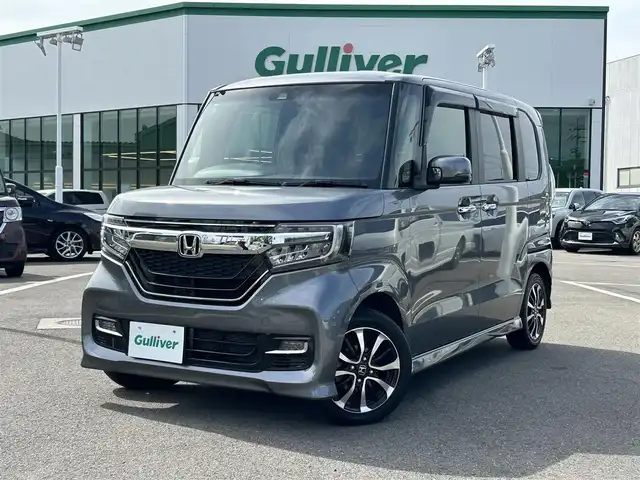 ホンダ Ｎ ＢＯＸ カスタム G L ホンダセンシング 愛媛県 2020(令2)年 1.6万km シャイニンググレーM 登録時走行距離151931km/ディーラーオプション純正ナビ/CD/DVD/TV/Bluetooth/バックカメラ/ビルトインETC/衝突軽減ブレーキ/車線維持支援システム/横滑り防止装置/前後コーナーセンサー/追従クルーズコントロール/助手席パワースライドドア/オートライト/LEDヘッドライト/スマートキー/純正アルミホイール/純正フロアマット