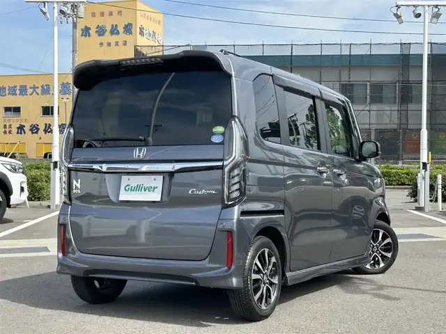 ホンダ Ｎ ＢＯＸ カスタム G L ホンダセンシング 愛媛県 2020(令2)年 1.6万km シャイニンググレーM 登録時走行距離151931km/ディーラーオプション純正ナビ/CD/DVD/TV/Bluetooth/バックカメラ/ビルトインETC/衝突軽減ブレーキ/車線維持支援システム/横滑り防止装置/前後コーナーセンサー/追従クルーズコントロール/助手席パワースライドドア/オートライト/LEDヘッドライト/スマートキー/純正アルミホイール/純正フロアマット