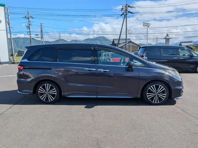 ホンダ オデッセイ アブソルート EX 福井県 2013(平25)年 9.4万km グラマラスモーブP 純正ナビ/フルセグテレビ/バックカメラ/両側パワースライドドア/ブラインドスポットモニター/クルーズコントロール/横滑り防止装置/アイドリングストップ/レーンキープアシスト/盗難防止装置/前後コーナーセンサー/ETC/純正フロアマット/エンジンスタートボタン/ハーフレザーシート/ダブル＋サイドエアバッグ/カーテンエアバッグ/LEDヘッドライト/純正18インチAW/スマートキー