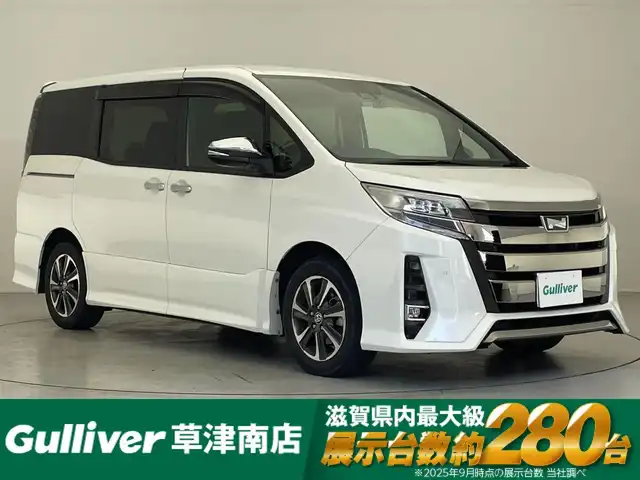 トヨタ ノア Si ダブルバイビーⅢ 滋賀県 2020(令2)年 4.6万km ホワイトパールクリスタルシャイン 純正9インチナビ/・フルセグTV/・Bluetooth/・CD/・DVD/バックカメラ/クルーズコントロール/前後ドライブレコーダー/両側パワースライドドア/ハーフレザーシート/ETC/オートライト/オートハイビーム/ＬＥＤヘッドライト/ＭＴモード付ＡＴ