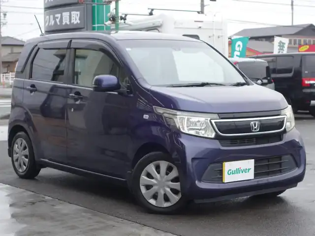 ホンダ Ｎ ＷＧＮ G Aパッケージ 静岡県 2015(平27)年 4.4万km プレミアムブルームーンパール ワンオーナー/禁煙車/純正7インチナビ(VXM-155VSi)/　BT/ワンセグTV/CD/DVD/SD/USB/iPod/バックカメラ/ステアリングスイッチ/HIDヘッドランプ/オートライト/オートエアコン/ABS/SRSエアバッグ/　運転席/助手席/サイド/カーテン/アイドリングストップシステム/衝突軽減ブレーキ/純正フロアマット/ドアバイザー/スマートキー/プッシュスタート/取扱説明書/保証書