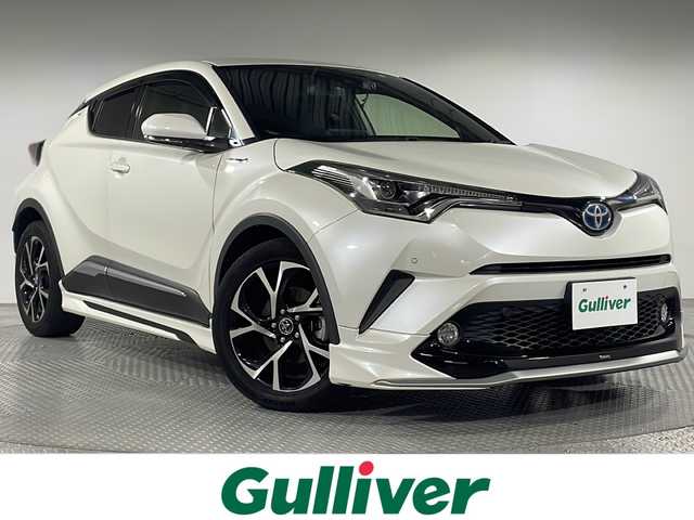 トヨタ Ｃ－ＨＲ G 神奈川県 2017(平29)年 6.7万km ホワイトパールクリスタルシャイン モデリスタエアロ　/バックカメラ　/純正9インチナビ　/‐AM/FM/CD/DVD/フルセグTV/Bluetooth　/Toyota Safety Sense P　/プリクラッシュセーフティシステム　/レーンディパーチャーアラート　/レーダークルーズコントロール　/オートマチックハイビーム　/ブランイドスポットモニター　/KENWOOD前後ドラレコ　/レザーシート　/シートヒーター