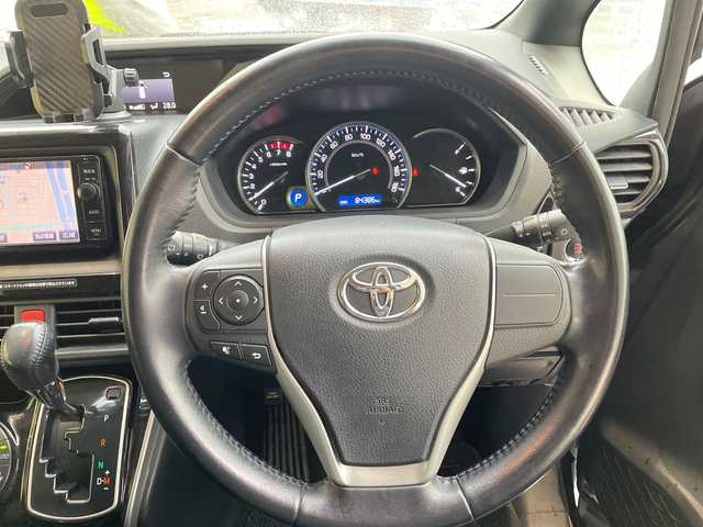 トヨタ エスクァイア Xi 愛知県 2015(平27)年 8.5万km スパークリングブラックパールクリスタルシャイン 純正ナビ/フリップダウンモニター/両側パワースライドドア/バックカメラ/純正アルミホイール/LEDヘッドライト/オートライト/ドライブレコーダー/ETC/フルセグ/CD DVD/Bluetooth/ステアリングスイッチ/スマートキー/プッシュスタート