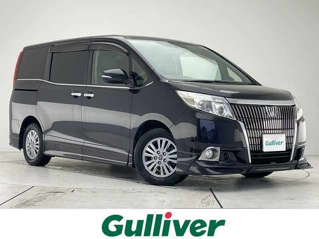 トヨタ エスクァイア Xi 愛知県 2015(平27)年 8.5万km スパークリングブラックパールクリスタルシャイン 純正ナビ/フリップダウンモニター/両側パワースライドドア/バックカメラ/純正アルミホイール/LEDヘッドライト/オートライト/ドライブレコーダー/ETC/フルセグ/CD DVD/Bluetooth/ステアリングスイッチ/スマートキー/プッシュスタート