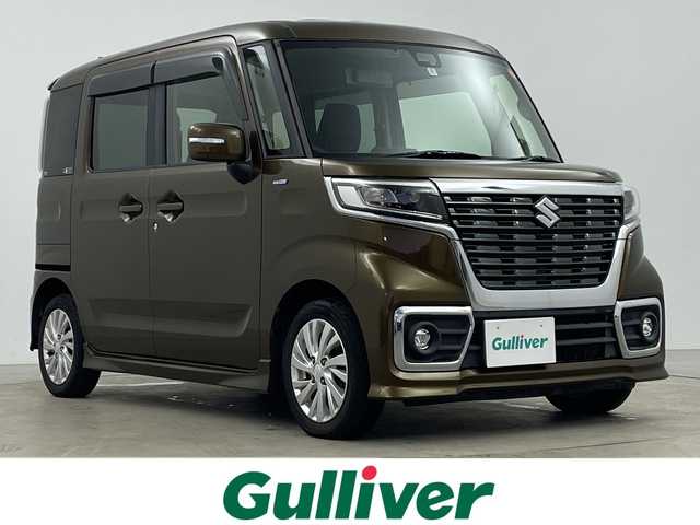 スズキ スペーシア カスタム HYBRID GS 鹿児島県 2018(平30)年 10.7万km ブレイブカーキP 社外SDナビゲーション/フルセグテレビ/Bluetooth/CD/DVD/FM/AM/スズキセーフティサポート/ビルトインETC/アイドリングストップ/運転席シートヒーター/バックカメラ/コーナーセンサー/片側パワースライドドア/純正アルミホイール/ドアバーザー/LEDヘッドライト