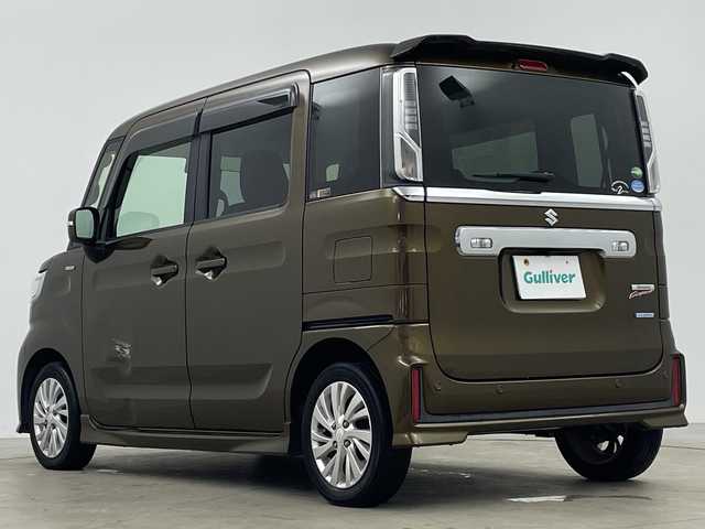 スズキ スペーシア カスタム HYBRID GS 鹿児島県 2018(平30)年 10.7万km ブレイブカーキP 社外SDナビゲーション/フルセグテレビ/Bluetooth/CD/DVD/FM/AM/スズキセーフティサポート/ビルトインETC/アイドリングストップ/運転席シートヒーター/バックカメラ/コーナーセンサー/片側パワースライドドア/純正アルミホイール/ドアバーザー/LEDヘッドライト