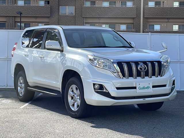 トヨタ ランドクルーザー プラド TX Lパッケージ 秋田県 2015(平27)年 12.7万km ホワイトパールクリスタルシャイン ワンオーナー/純正SDナビ/DVD　CD DTV　BT　ラジオ　/バックカメラ/ビルトインETC/寒冷地仕様/レザーシート/シートヒーター/モデリスタエアロ/クルーズコントロール/フロアマット/ドアバイザー