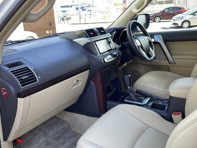 トヨタ ランドクルーザー プラド TX Lパッケージ 秋田県 2015(平27)年 12.7万km ホワイトパールクリスタルシャイン ワンオーナー/純正SDナビ/DVD　CD DTV　BT　ラジオ　/バックカメラ/ビルトインETC/寒冷地仕様/レザーシート/シートヒーター/モデリスタエアロ/クルーズコントロール/フロアマット/ドアバイザー