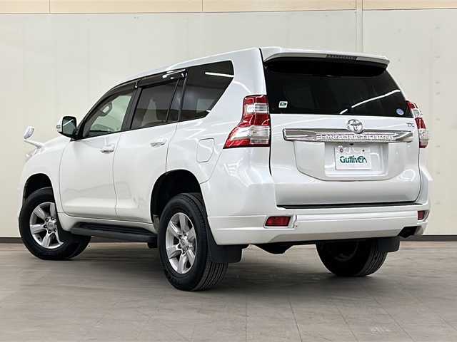 トヨタ ランドクルーザー プラド TX Lパッケージ 道央・札幌 2015(平27)年 12.7万km ホワイトパールクリスタルシャイン ワンオーナー/純正SDナビ/DVD　CD DTV　BT　ラジオ　/バックカメラ/ビルトインETC/寒冷地仕様/レザーシート/シートヒーター/モデリスタエアロ/クルーズコントロール/フロアマット/ドアバイザー
