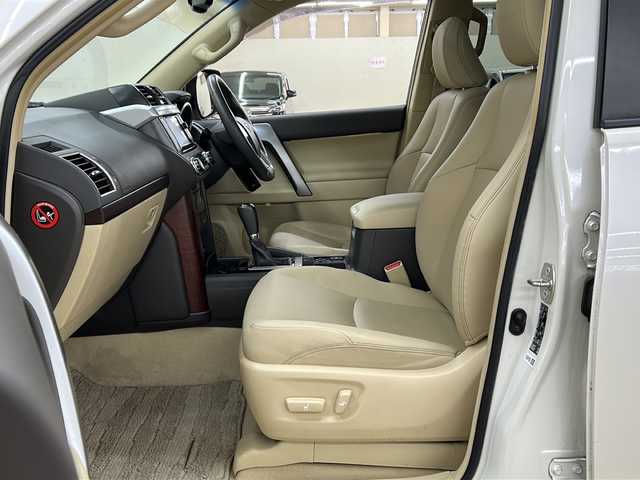 トヨタ ランドクルーザー プラド TX Lパッケージ 道央・札幌 2015(平27)年 12.7万km ホワイトパールクリスタルシャイン ワンオーナー/純正SDナビ/DVD　CD DTV　BT　ラジオ　/バックカメラ/ビルトインETC/寒冷地仕様/レザーシート/シートヒーター/モデリスタエアロ/クルーズコントロール/フロアマット/ドアバイザー