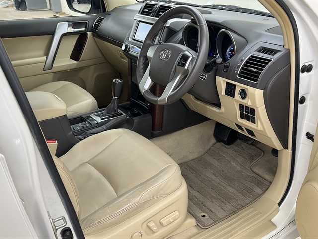 トヨタ ランドクルーザー プラド TX Lパッケージ 道央・札幌 2015(平27)年 12.7万km ホワイトパールクリスタルシャイン ワンオーナー/純正SDナビ/DVD　CD DTV　BT　ラジオ　/バックカメラ/ビルトインETC/寒冷地仕様/レザーシート/シートヒーター/モデリスタエアロ/クルーズコントロール/フロアマット/ドアバイザー