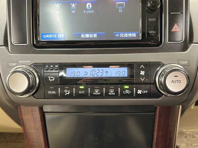 トヨタ ランドクルーザー プラド TX Lパッケージ 道央・札幌 2015(平27)年 12.7万km ホワイトパールクリスタルシャイン ワンオーナー/純正SDナビ/DVD　CD DTV　BT　ラジオ　/バックカメラ/ビルトインETC/寒冷地仕様/レザーシート/シートヒーター/モデリスタエアロ/クルーズコントロール/フロアマット/ドアバイザー