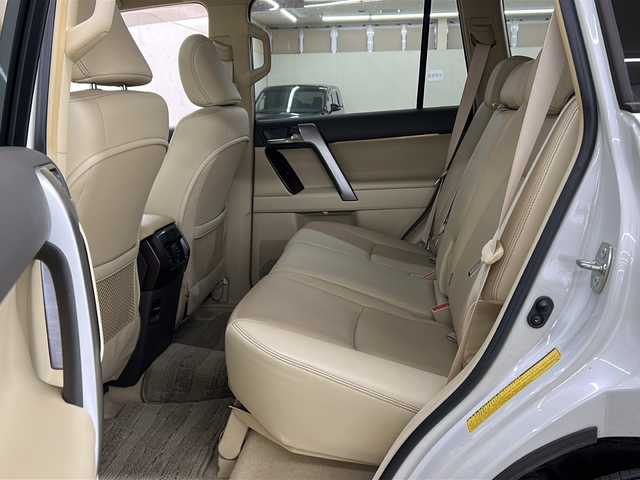 トヨタ ランドクルーザー プラド TX Lパッケージ 道央・札幌 2015(平27)年 12.7万km ホワイトパールクリスタルシャイン ワンオーナー/純正SDナビ/DVD　CD DTV　BT　ラジオ　/バックカメラ/ビルトインETC/寒冷地仕様/レザーシート/シートヒーター/モデリスタエアロ/クルーズコントロール/フロアマット/ドアバイザー