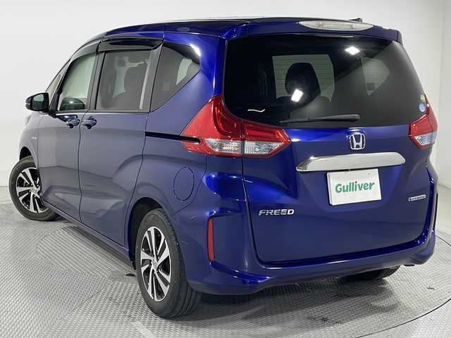 ホンダ フリード ハイブリット EX 広島県 2019(令1)年 5.1万km コバルトブルーパール 禁煙車/純正９型ナビ/両側パワースライドドア/バックカメラ/レーダークルーズコントロール/シートヒーター/ドラレコ/ＥＴＣ/衝突被害軽減システム/レーンキープアシスト/ＬＥＤヘッドライト/踏間違防止/ステアリングスイッチ/エアバッグ(運転席/助手席/サイド/カーテン)/純正15インチアルミホイール(185/65/R15)