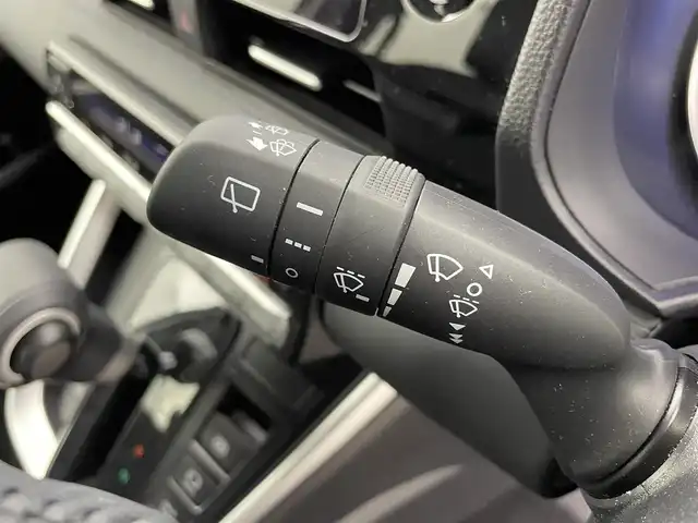 トヨタ ヴォクシー ハイブリッド S－Z 富山県 2025(令7)年 1.4万km ホワイトパールクリスタルシャイン 純正10.5型ディスプレイオーディオ/（AM/FM/DVD/BT/USB/HDMI/フルセグ）/バックカメラ/ビルトインETC2.0/ハーフレザーシート/D/N席シートヒーター/両側パワースライドドア/衝突被害軽減システム/レーダークルーズコントロール/レーンキープアシスト/コーナーセンサー/横滑り防止装置/アイドリングストップ/純正アルミホイール/オートLEDライト/オートマチックハイビーム/革巻きステアリング/ステアリングスイッチ/スマートキー/スペアキー