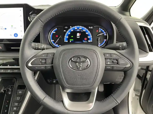 トヨタ ヴォクシー ハイブリッド S－Z 富山県 2025(令7)年 1.4万km ホワイトパールクリスタルシャイン 純正10.5型ディスプレイオーディオ/（AM/FM/DVD/BT/USB/HDMI/フルセグ）/バックカメラ/ビルトインETC2.0/ハーフレザーシート/D/N席シートヒーター/両側パワースライドドア/衝突被害軽減システム/レーダークルーズコントロール/レーンキープアシスト/コーナーセンサー/横滑り防止装置/アイドリングストップ/純正アルミホイール/オートLEDライト/オートマチックハイビーム/革巻きステアリング/ステアリングスイッチ/スマートキー/スペアキー