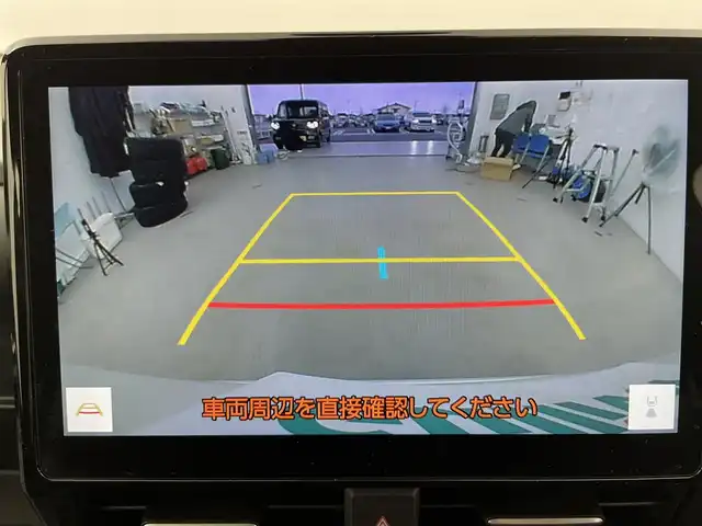 トヨタ ヴォクシー ハイブリッド S－Z 富山県 2025(令7)年 1.4万km ホワイトパールクリスタルシャイン 純正10.5型ディスプレイオーディオ/（AM/FM/DVD/BT/USB/HDMI/フルセグ）/バックカメラ/ビルトインETC2.0/ハーフレザーシート/D/N席シートヒーター/両側パワースライドドア/衝突被害軽減システム/レーダークルーズコントロール/レーンキープアシスト/コーナーセンサー/横滑り防止装置/アイドリングストップ/純正アルミホイール/オートLEDライト/オートマチックハイビーム/革巻きステアリング/ステアリングスイッチ/スマートキー/スペアキー