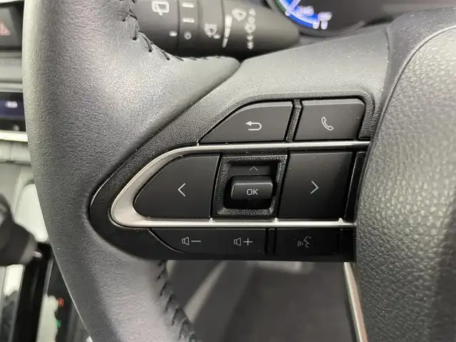 トヨタ ヴォクシー ハイブリッド S－Z 富山県 2025(令7)年 1.4万km ホワイトパールクリスタルシャイン 純正10.5型ディスプレイオーディオ/（AM/FM/DVD/BT/USB/HDMI/フルセグ）/バックカメラ/ビルトインETC2.0/ハーフレザーシート/D/N席シートヒーター/両側パワースライドドア/衝突被害軽減システム/レーダークルーズコントロール/レーンキープアシスト/コーナーセンサー/横滑り防止装置/アイドリングストップ/純正アルミホイール/オートLEDライト/オートマチックハイビーム/革巻きステアリング/ステアリングスイッチ/スマートキー/スペアキー