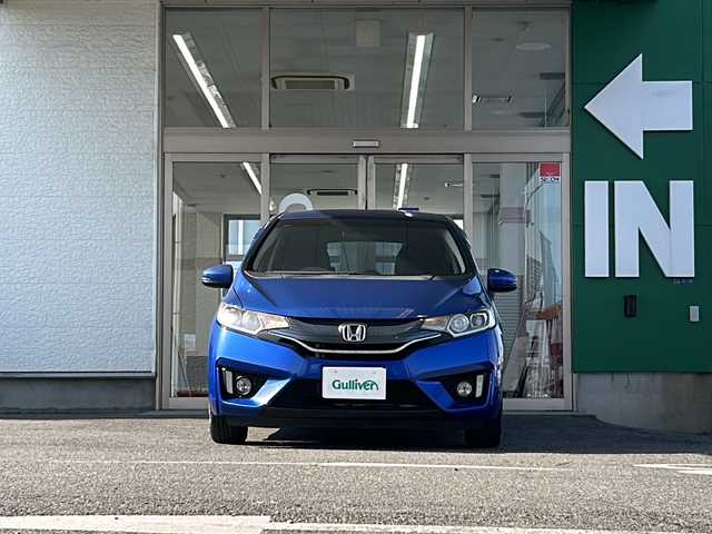 ホンダ フィット 13G Sパッケージ 愛知県 2014(平26)年 12.1万km ブリリアントスポーティブルーメタリック2トーン 禁煙車/プッシュスタート/イクリプスSDナビ/フルセグTV/バックカメラ/ETC/純正LEDヘッドライト/スマートキー/CD・DVD/パドルシフト/純正フロアマット/ドアバイザー/電格ミラー/スマートスペアキー/取扱説明書/保証書