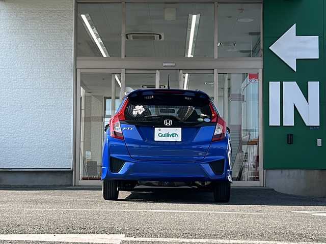 ホンダ フィット 13G Sパッケージ 愛知県 2014(平26)年 12.1万km ブリリアントスポーティブルーメタリック2トーン 禁煙車/プッシュスタート/イクリプスSDナビ/フルセグTV/バックカメラ/ETC/純正LEDヘッドライト/スマートキー/CD・DVD/パドルシフト/純正フロアマット/ドアバイザー/電格ミラー/スマートスペアキー/取扱説明書/保証書
