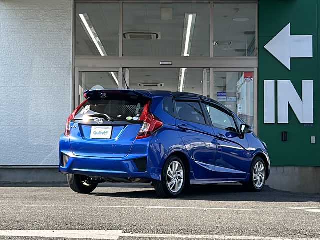 ホンダ フィット 13G Sパッケージ 愛知県 2014(平26)年 12.1万km ブリリアントスポーティブルーメタリック2トーン 禁煙車/プッシュスタート/イクリプスSDナビ/フルセグTV/バックカメラ/ETC/純正LEDヘッドライト/スマートキー/CD・DVD/パドルシフト/純正フロアマット/ドアバイザー/電格ミラー/スマートスペアキー/取扱説明書/保証書