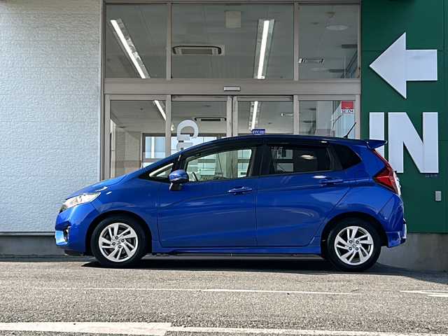 ホンダ フィット 13G Sパッケージ 愛知県 2014(平26)年 12.1万km ブリリアントスポーティブルーメタリック2トーン 禁煙車/プッシュスタート/イクリプスSDナビ/フルセグTV/バックカメラ/ETC/純正LEDヘッドライト/スマートキー/CD・DVD/パドルシフト/純正フロアマット/ドアバイザー/電格ミラー/スマートスペアキー/取扱説明書/保証書