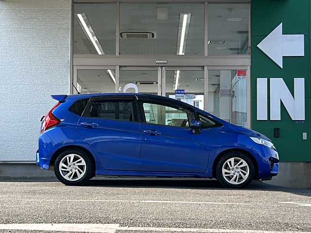 ホンダ フィット 13G Sパッケージ 愛知県 2014(平26)年 12.1万km ブリリアントスポーティブルーメタリック2トーン 禁煙車/プッシュスタート/イクリプスSDナビ/フルセグTV/バックカメラ/ETC/純正LEDヘッドライト/スマートキー/CD・DVD/パドルシフト/純正フロアマット/ドアバイザー/電格ミラー/スマートスペアキー/取扱説明書/保証書