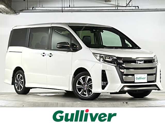 トヨタ ノア Si ダブルバイビーⅢ 広島県 2021(令3)年 5.7万km ホワイトパールクリスタルシャイン 禁煙/純正ナビ/CD/DVD/DTV/Bluetooth/バックカメラ/フリップダウンモニター/両側パワースライドドア /クルーズコントロール/LEDオートライト/オートマチックハイビーム /LDA/ビルトインETC/ドライブレコーダー/コーナーセンサー /純正アルミホイール/スマートキー/プッシュスタート /純正フロアマット/後席エアコン/アイドリングストップ
