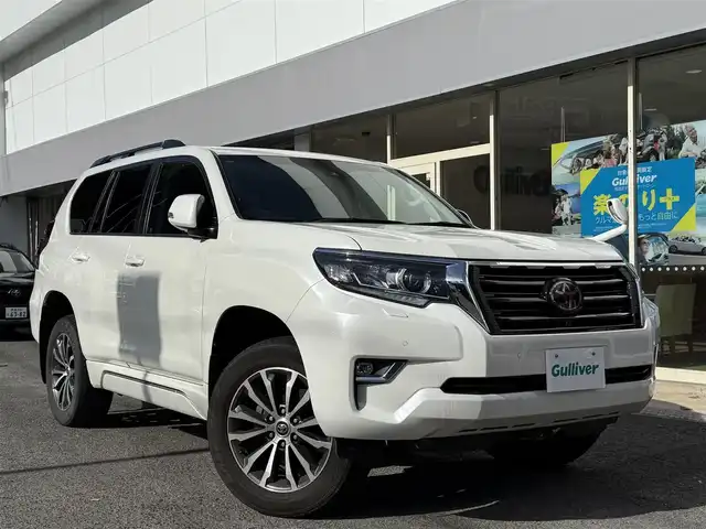 トヨタ ランドクルーザー プラド TX Lパッケージ 長崎県 2021(令3)年 5.6万km ホワイトパールクリスタルシャイン サンルーフ/黒革シート/・パワーシート/・シートヒーター/エアシート/トヨタセーフティセンス/・衝突被害軽減ブレーキ/・レーダークルーズコントロール/・レーンキープアシスト/・オートマチックハイビーム/社外メモリナビ【AVIC-CQ911】/・Bluetooth接続/・フルセグTV/・DVD再生/バックカメラ/ビルトインETC/コーナーセンサー/オートサイドステップ/ヘッドライトウォッシャー/ドライブレコーダー/MTモード付AT/革巻きステアリング