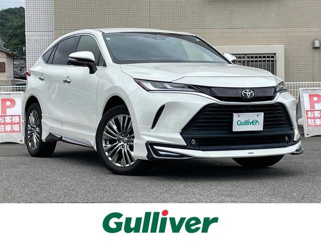 トヨタ ハリアー Z 山口県 2021(令3)年 4.2万km ホワイトパールクリスタルシャイン ワンオーナー/モデリスタ エアロ/JBL 12.3型メーカーナビ/フルセグTV BT USB AUX/全周囲カメラ/デジタルインナーミラー/パワーバックドア/ビルトイン 2.0ETC/衝突被害軽減ブレーキ/レーダークルーズコントロール/レーンアシスト/オートマチックハイビーム/ブラインドスポットモニタ/LEDオートヘッドライト/フォグライト/コーナーセンサー/ハーフレザーシート/パワーシート/ドラレコ/19インチ アルミホイール/スマートキー 2個/保証書 取説 ナビ取説