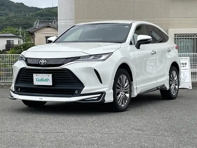 トヨタ ハリアー Z 山口県 2021(令3)年 4.2万km ホワイトパールクリスタルシャイン ワンオーナー/モデリスタ エアロ/JBL 12.3型メーカーナビ/フルセグTV BT USB AUX/全周囲カメラ/デジタルインナーミラー/パワーバックドア/ビルトイン 2.0ETC/衝突被害軽減ブレーキ/レーダークルーズコントロール/レーンアシスト/オートマチックハイビーム/ブラインドスポットモニタ/LEDオートヘッドライト/フォグライト/コーナーセンサー/ハーフレザーシート/パワーシート/ドラレコ/19インチ アルミホイール/スマートキー 2個/保証書 取説 ナビ取説