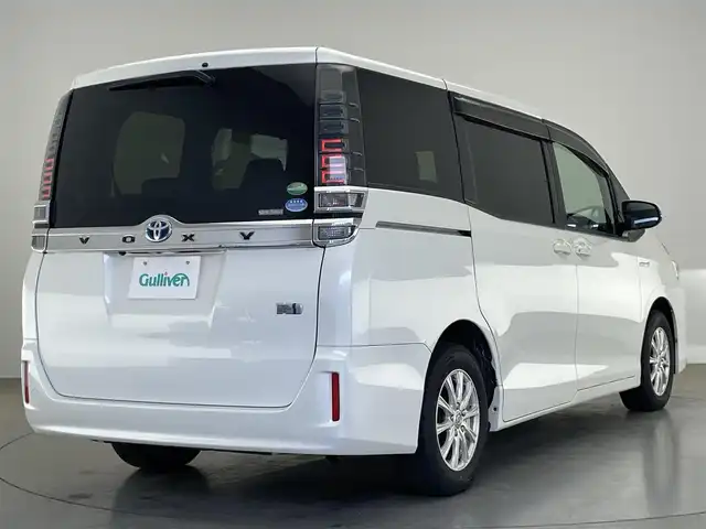 トヨタ ヴォクシー ハイブリッド V 愛知県 2018(平30)年 7.5万km ホワイトパールクリスタルシャイン 純正９型ナビ　フルセグＴＶ　Ｂｌｕｅｔｏｏｔｈ　シートヒーター　両側パワースライドドア　クルーズコントロール　セーフティセンス　衝突軽減　車線逸脱　ＬＥＤオートライト　ドラレコ　バックカメラ　禁煙車