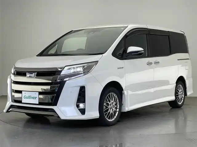 トヨタ ノア ハイブリッド Si ダブルバイビーⅡ 愛知県 2019(令1)年 7.8万km ホワイトパールクリスタルシャイン 純正１０型ナビ　フルセグＴＶ　Ｂｌｕｅｔｏｏｔｈ　HDMIポート　USB　純正後席モニター　バックカメラ　シートヒーター　ハーフレザー　両側パワースライドドア　前後ドラレコ　セーフティセンス　衝突軽減装置　クルコン　禁煙車