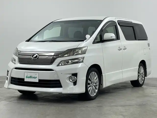 トヨタ ヴェルファイア 2．4Z 群馬県 2013(平25)年 7万km ホワイトパールクリスタルシャイン 純正７インチナビ/CD/DVD/SD/Bluetooth/フルセグTV/バックカメラ/純正１１型後席モニター/片側パワースライドドア/クリアランスソナー/ナノイー/ステアリングリモコン/オートライト/HIDヘッドライト/ハロゲンフォグ/電格ミラー/ウィンカーミラー/純正AW/ETC/革巻きステアリング/オットマン/純正マット/バイザー/プッシュスタート/スマートキー