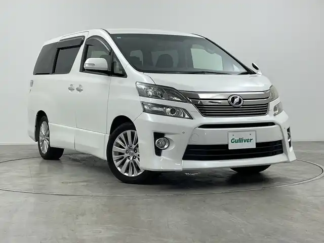 トヨタ ヴェルファイア 2．4Z 群馬県 2013(平25)年 7万km ホワイトパールクリスタルシャイン 純正７インチナビ/CD/DVD/SD/Bluetooth/フルセグTV/バックカメラ/純正１１型後席モニター/片側パワースライドドア/クリアランスソナー/ナノイー/ステアリングリモコン/オートライト/HIDヘッドライト/ハロゲンフォグ/電格ミラー/ウィンカーミラー/純正AW/ETC/革巻きステアリング/オットマン/純正マット/バイザー/プッシュスタート/スマートキー