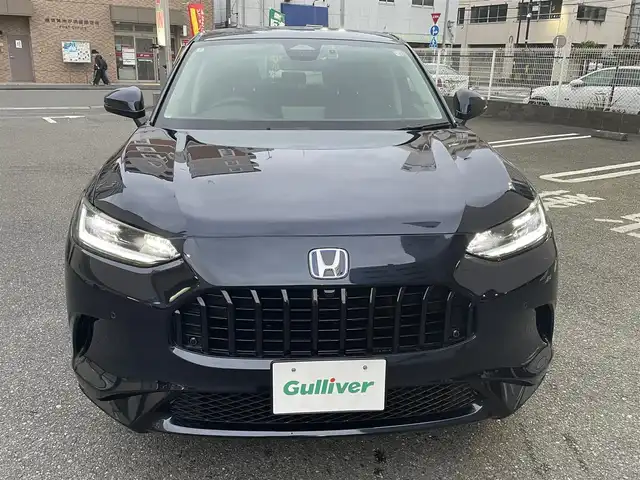 ホンダ ＺＲ－Ｖ ハイブリッド e:HEV Z 神奈川県 2024(令6)年 0.9万km ミッドナイトブルービームM ワンオーナー/４WD/Honda SENSING/・衝突軽減ブレーキ/・踏み間違い衝突軽減システム/・路外逸脱抑制機能/・歩行者事故低減ステアリング/・先行車発進お知らせ機能/・標識認識機能/・オートハイビーム/・アダプティブドライビングビーム/・ブラインドスポットインフォメーション/・後退出庫サポート/・パーキングセンサーシステム/・アダプティブクルーズコントロール/・車線逸脱支援システム/・トラフィックジャムアシスト/Honda CONNECTディスプレイ/・ナビ機能/スマホ連動/フルセグTV/BT//マルチビューカメラシステム/ビルトインETC2.0/革シート/・全席シートヒーター/・前席パワーシート/・D席メモリシート/パドルシフト/ステアリングリモコン/置くだけ充電/前後ドライブレコーダー/パワーテールゲート/純正１８inアルミホイール/オートライト/LEDライト/ウインカー付電格ミラー/電動パーキングブレーキ/ブレーキホールド/W＆サイド＆カーテンエアバック/横滑り防止装置/ヒルディセントコントロール/フロアマット/保証書/取扱説明書/スペアキー