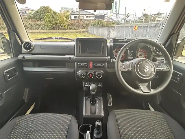 スズキ ジムニー ノマド FC 長崎県 2025(令7)年 0.3万km ベージュⅡ ワンオーナー/衝突軽減システム/レーンアシスト/レーダークルーズ/シートヒーター/スマートキー/プッシュスタート/電動格納ミラー/アイドリングストップ/純正15インチAW